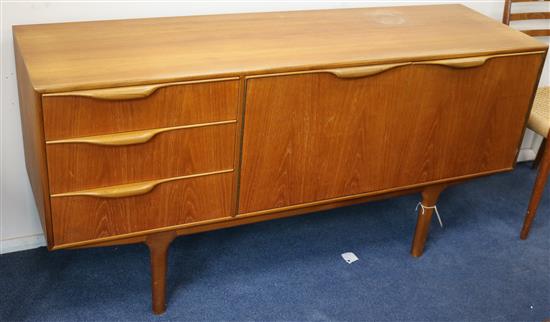 A McIntosh teak sideboard, fitted three small drawers and two cupboards W.152cm